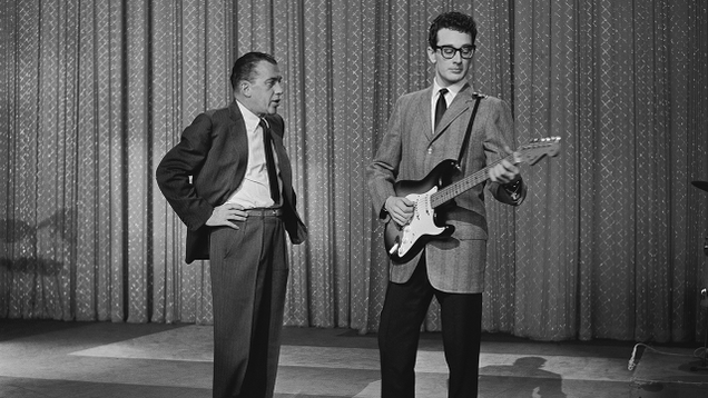Illustration for article titled Remembering A Legend: 5 Times Buddy Holly Performed In Front Of An Audience Of 2,000 Fortune-Tellers All Screaming At Him To Never Get On An Airplane